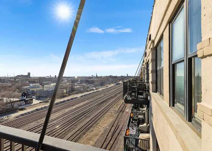Modern Historic Loft 19ft Ceilings, Gym, Heated Parking, Skyline Views, Balcony Apartment *
