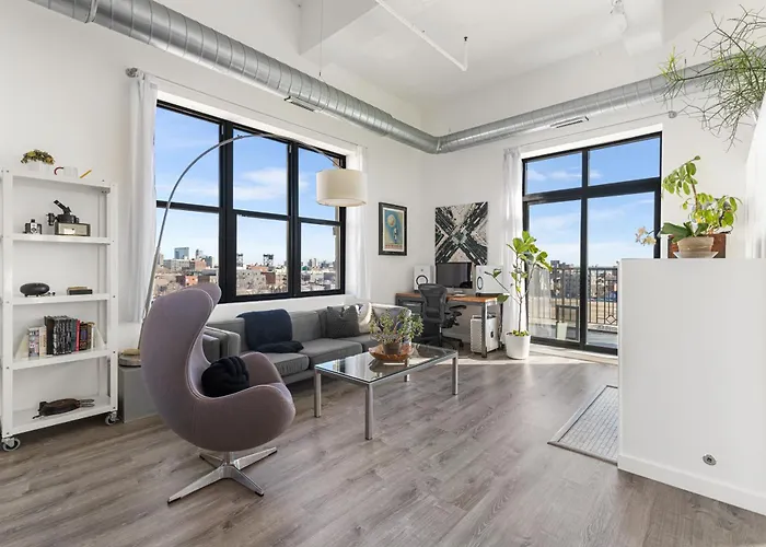 Modern Historic Loft 19ft Ceilings, Gym, Heated Parking, Skyline Views, Balcony