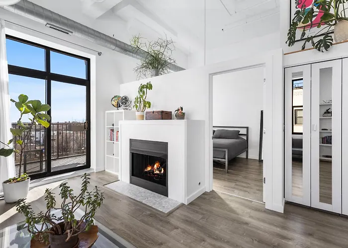 Modern Historic Loft 19ft Ceilings, Gym, Heated Parking, Skyline Views, Balcony *