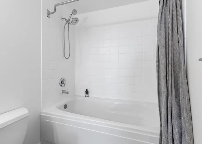 Modern Historic Loft 19ft Ceilings, Gym, Heated Parking, Skyline Views, Balcony *