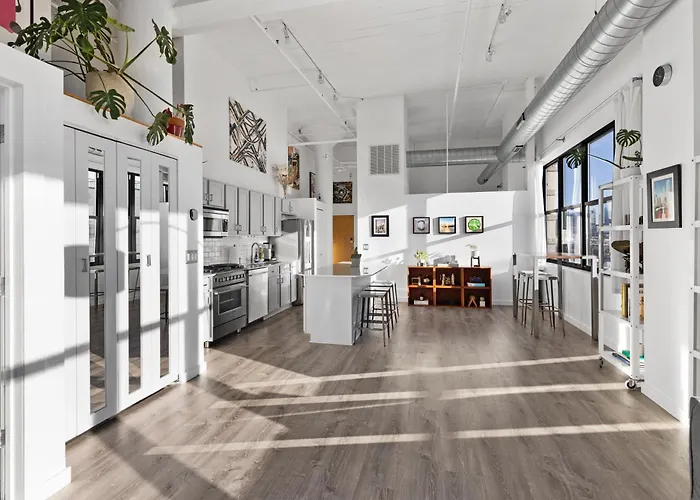 Modern Historic Loft 19ft Ceilings, Gym, Heated Parking, Skyline Views, Balcony
