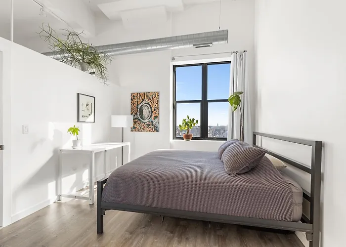 Modern Historic Loft 19ft Ceilings, Gym, Heated Parking, Skyline Views, Balcony Apartment