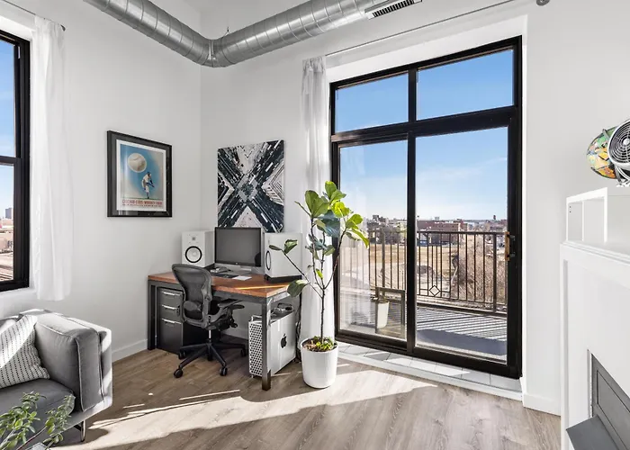 Modern Historic Loft 19ft Ceilings, Gym, Heated Parking, Skyline Views, Balcony *