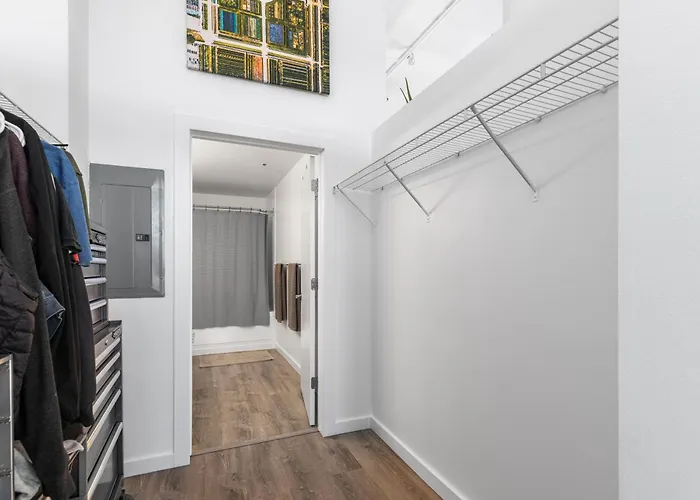 Modern Historic Loft 19ft Ceilings, Gym, Heated Parking, Skyline Views, Balcony