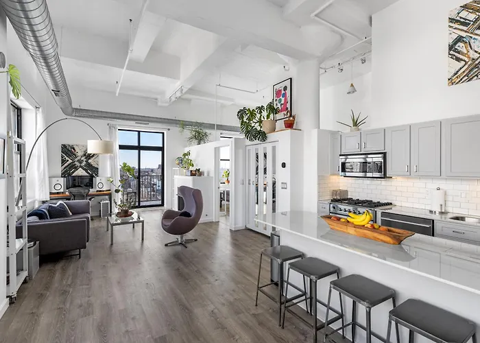 Modern Historic Loft 19ft Ceilings, Gym, Heated Parking, Skyline Views, Balcony Apartment *